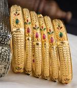 Gold bangles-and-bracelets