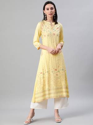 Yellow printed rayon kurtas-and-kurtis 5