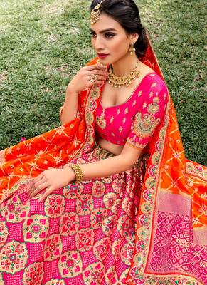 Pink Silk Bridal Designer lehnga with Heavy Embroidery 2