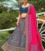 BlueSilk Bridal Designer lehnga with Heavy Embroidery