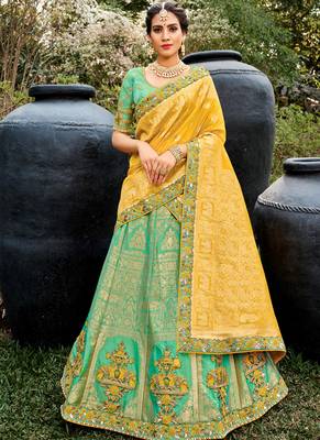 Turquise Silk Bridal Designer lehnga with Heavy Embroidery 1