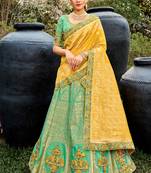 Turquise Silk Bridal Designer lehnga with Heavy Embroidery