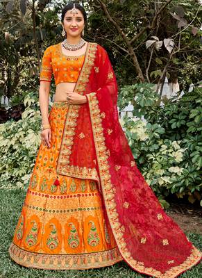 Orange Silk Bridal Designer lehnga with Heavy Embroidery 1