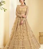 Beige embroidered net semi stitched lehenga