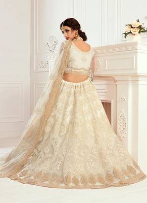 White embroidered net semi stitched lehenga 2