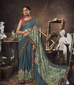 Turquoise embroidered jute saree with blouse