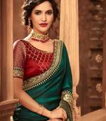 Dark green embroidered art silk blend saree with blouse