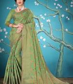 Green woven cotton saree with blouse