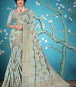 Light green woven cotton saree with blouse