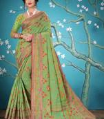 Green woven cotton saree with blouse