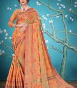 Peach woven cotton saree with blouse