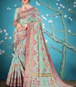 Light green woven cotton saree with blouse