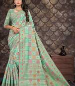 Light green woven cotton saree with blouse