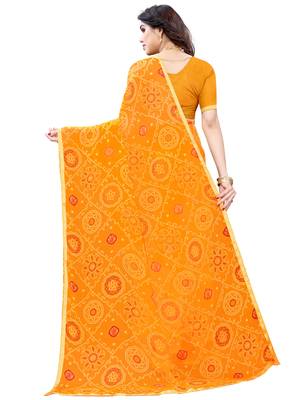 Yellow printed chiffon saree with blouse 3