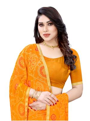 Yellow printed chiffon saree with blouse 5