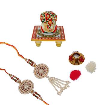 Designer Bhaiya Bhabhi Rakhi Set with Lord Ganesha on Kundan Studded Marble Chowki and Roli Tikka Matki 1