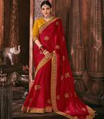 Red embroidered satin saree with blouse