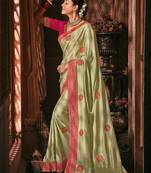 Light parrot green embroidered satin saree with blouse