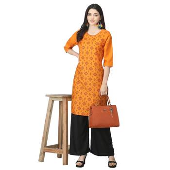 Orange printed cotton kurtas-and-kurtis 5