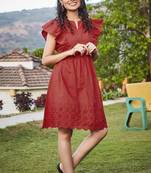 Red embroidered cotton tunics