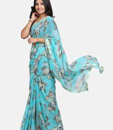 Turquoise printed georgette saree with blouse