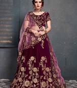 Purple embroidered velvet semi stitched lehenga