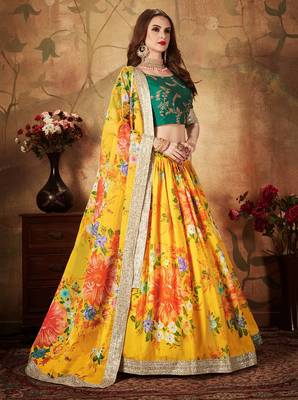 Yellow embroidered organza semi stitched lehenga 3