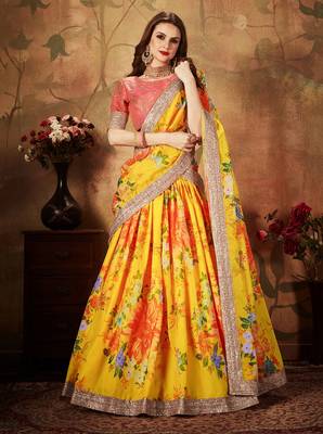 Yellow embroidered organza semi stitched lehenga 1