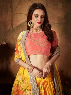 Yellow embroidered organza semi stitched lehenga 4