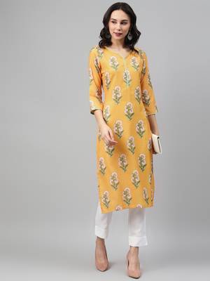 Yellow printed rayon kurtas-and-kurtis 5