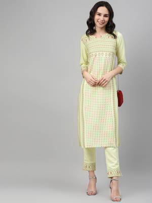 Yellow printed rayon kurtas-and-kurtis 5