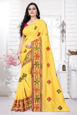 Yellow embroidered georgette saree with blouse 1