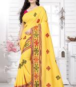 Yellow embroidered georgette saree with blouse