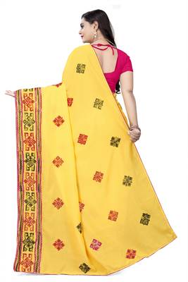 Yellow embroidered georgette saree with blouse 4