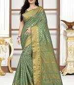Green embroidered cotton silk saree with blouse