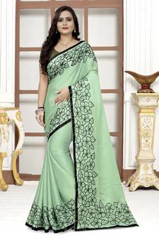 Green embroidered banarasi silk saree with blouse