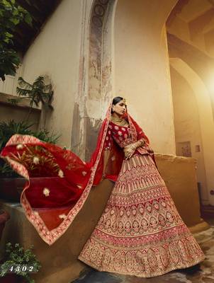 Red embroidered velvet semi stitched lehenga 2