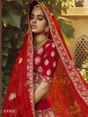 Red embroidered velvet semi stitched lehenga 3