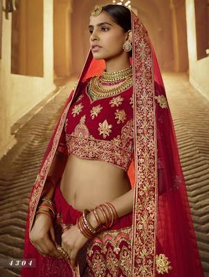 Red embroidered velvet semi stitched lehenga 2