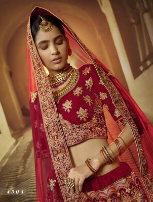 Red embroidered velvet semi stitched lehenga 3