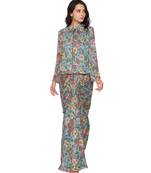 green  printed drape skirt paired with printed zipper jacket