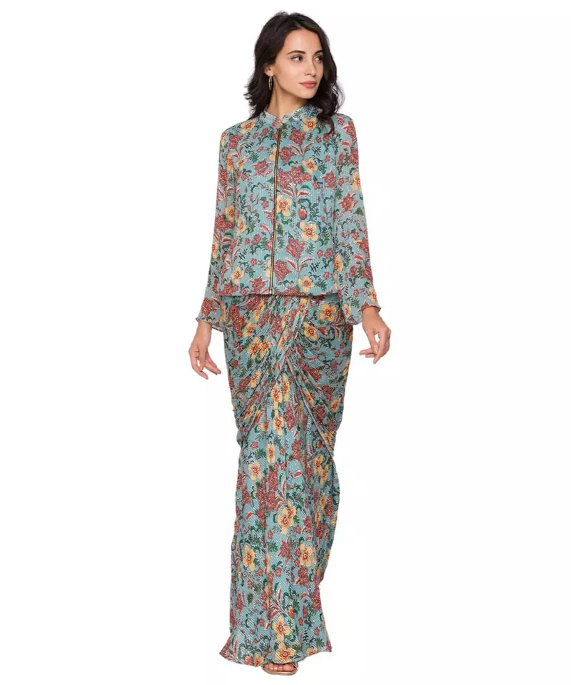 green  printed drape skirt paired with printed zipper jacket