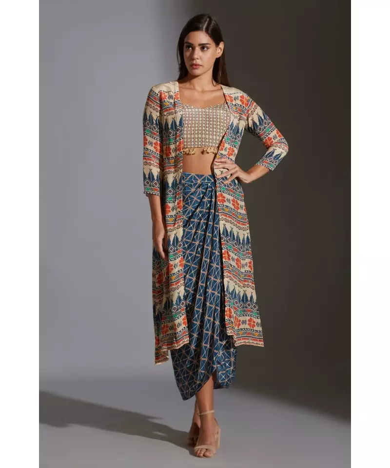 printed bustier with tassel detail paired with dhoti drape skirt and jacket