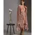 drape dress with side cut paired with net cape