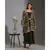 printed rushed jumpsuit with belt and paired with sequence cape