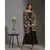 printed rushed jumpsuit with belt and paired with sequence cape