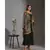 printed rushed jumpsuit with belt and paired with sequence cape
