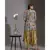 printed dhoti jumpsuit paired with asymmetrical jacket