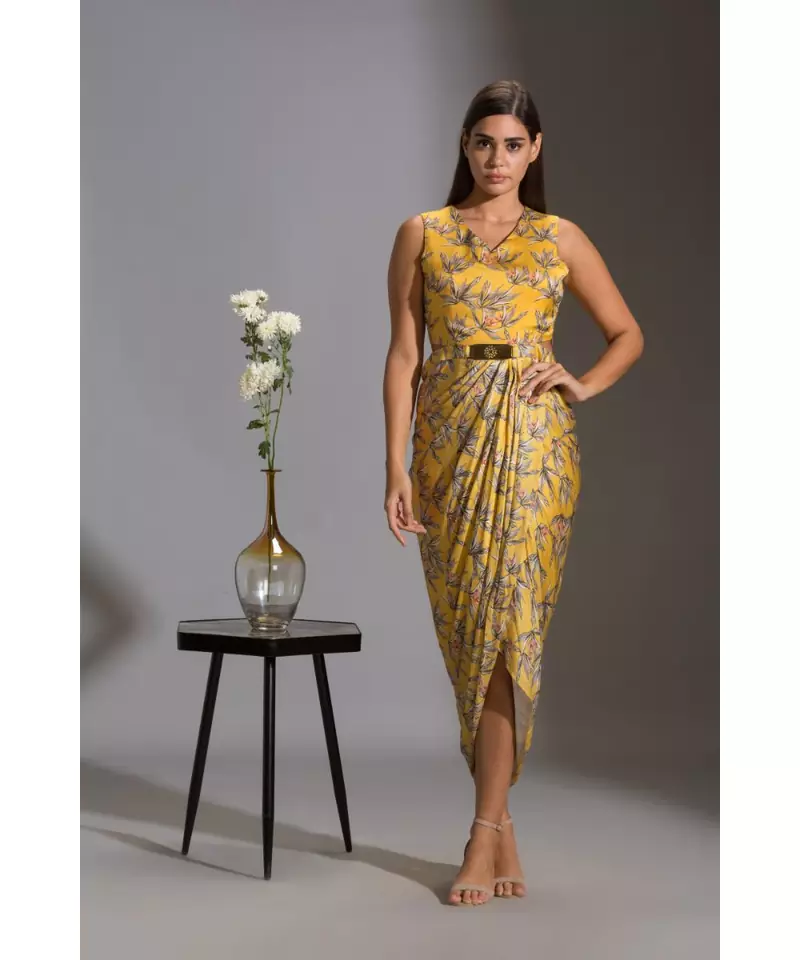 printed drape dress with side cuts paired with printed jackets and tassel detail