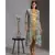 printed drape dress with side cuts paired with printed jackets and tassel detail